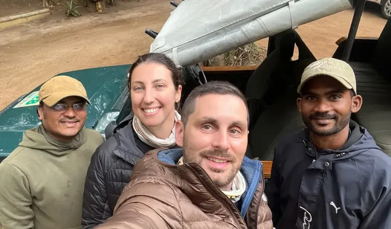 our guest enjoying their safari with driver and local naturalist