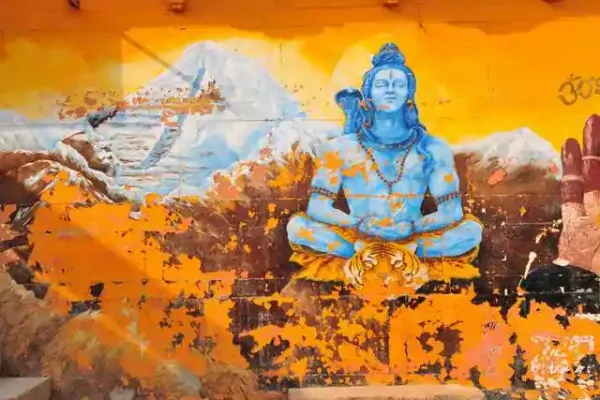 Telephoto image of 1930's old worn mural of Shiva on the holiest Dasashvamedha ghat
